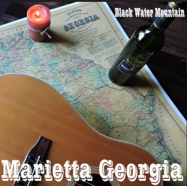 Guitar and wine bottle on Georgia map